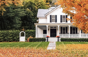 Residential home with colorful fall leaves in the yard.