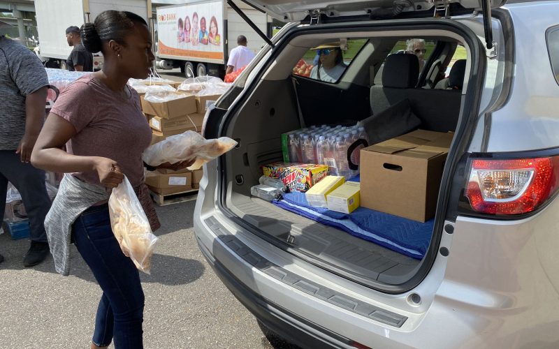 Mobile pantry distributing groceries to community members during a scheduled outreach.